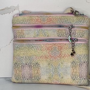 Ruth: natural Cork with Muted Multicolored Leaves 4 Pocket Medium Crossbody